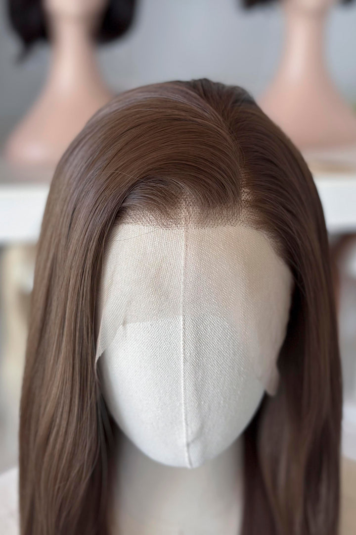 18" straight natural brown lace front wig display in a wig shop.
