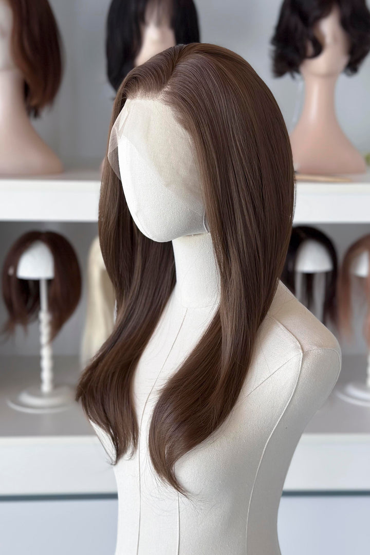 18" straight natural brown lace front wig display in a wig shop.