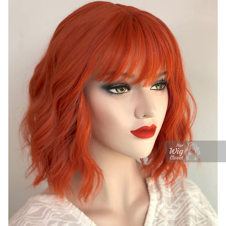 Lola | 12" Orange Wavy Bob Synthetic Wig with Bangs Her Wig Closet