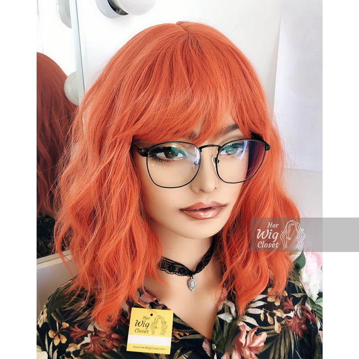 Lola | 12" Orange Wavy Bob Synthetic Wig with Bangs Her Wig Closet